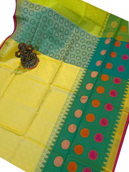 Yellow and Green kora silk saree with kuppatam border